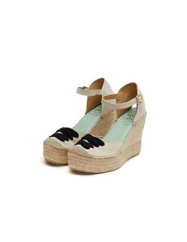 Beige espadrille wedges with ankle strap and decorative laces 