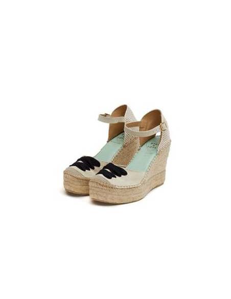 Beige espadrille wedges with ankle strap and decorative laces 