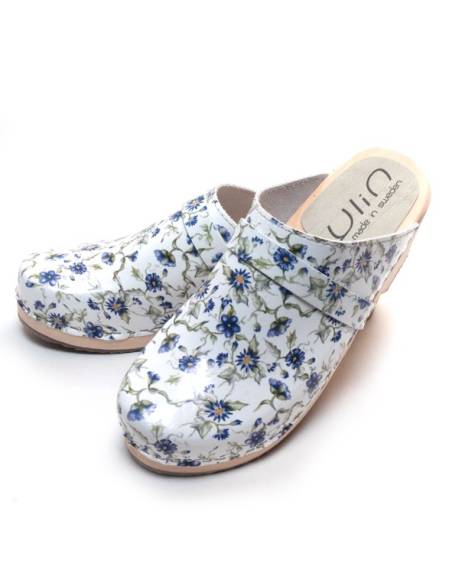Sabots suédois femme en cuir blanc à motifs floraux bleus 