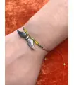 Bracelet vert, jaune et argent breloque ailes argent