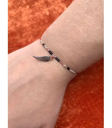 Bracelet réglable rouge noir aile argent et perle de verre