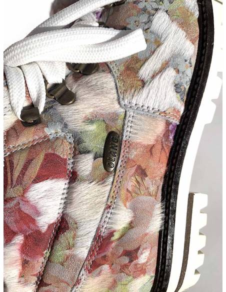 Détails de cuir des bottines après ski olang fourrure et cuir coloré 