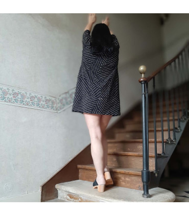Women's tunic dress with asymmetric patterns in black and white