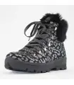 Women's winter boots in black leather with silver spots and rabbit fur collar